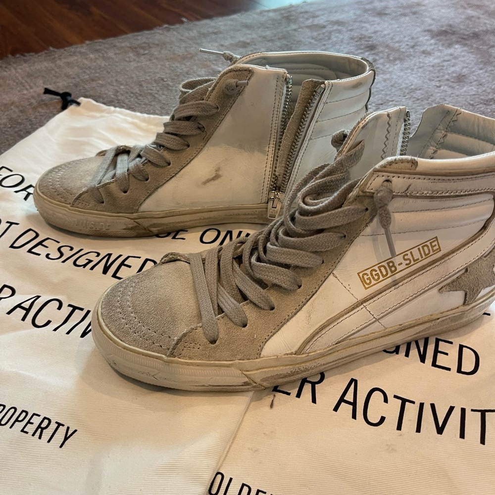 Golden goose high tops.